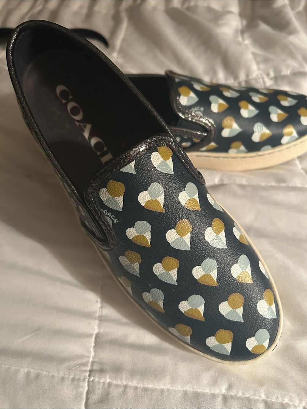 COACH New Navy Heart-Print Slip-On Sneakers with White & Gold Accents
